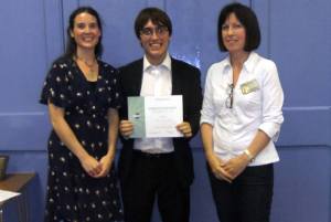 Sam Billington receives his certificate for finishing 2nd in the 2013 MSC Humorous Speech Contest.