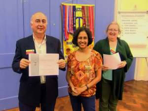 Steve Catchick presented with his runner's-up certificate for the Table Topics Contest